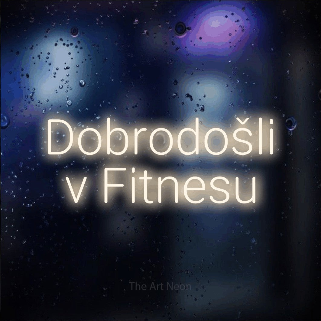 LED neon sign reading “Dobrodošli v Fitnesu”, arranged in two lines.