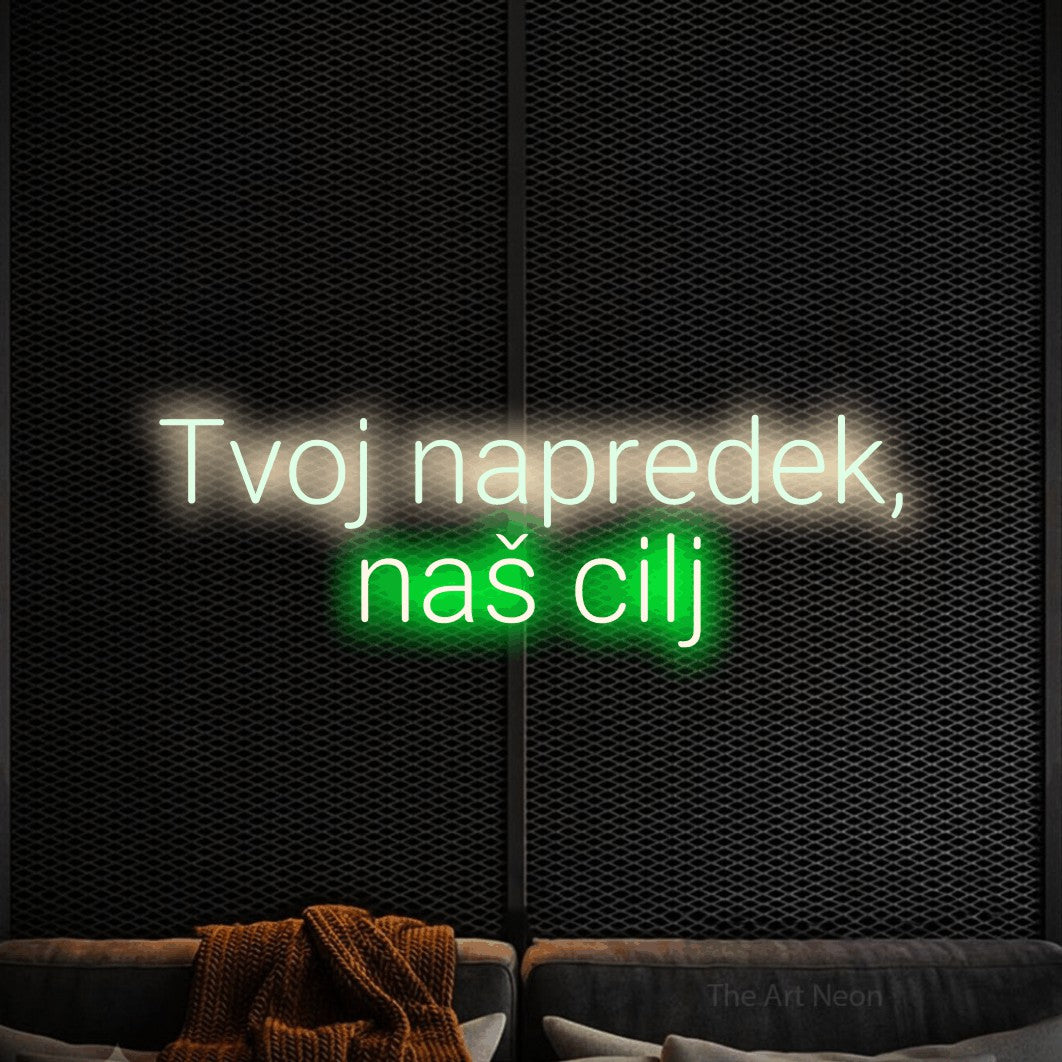 LED neon sign reading “Tvoj napredek, naš cilj”, arranged in two lines.