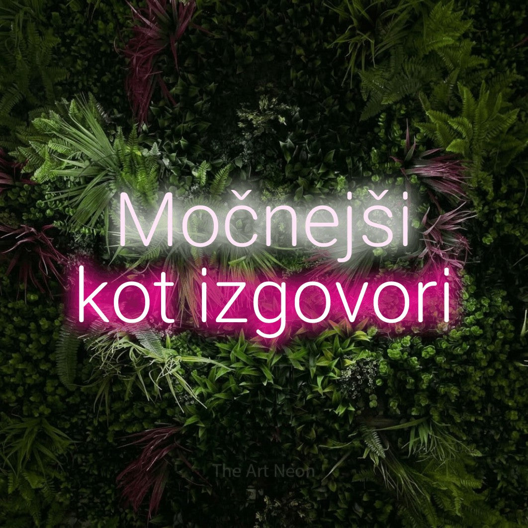 LED neon sign reading “Močnejši kot izgovori”, arranged in two lines.