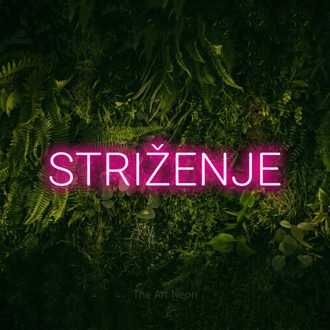 LED neon sign reading “STRIŽENJE”, arranged in a single line.
