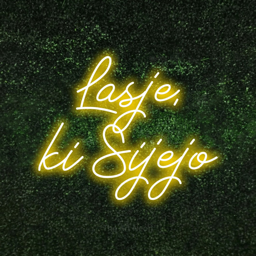 LED neon sign reading “Lasje, ki Sijejo”, arranged in two lines.