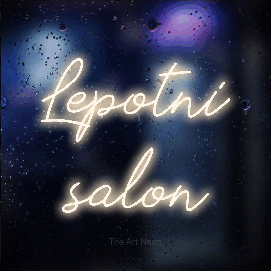 LED neon sign reading “Lepotni salon”, arranged in two lines.