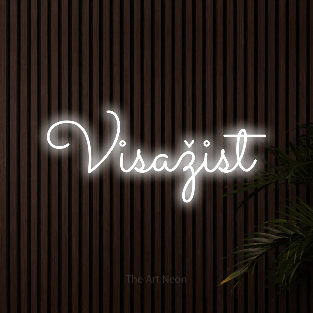 LED neon sign reading “Visažist”, arranged in a single line.