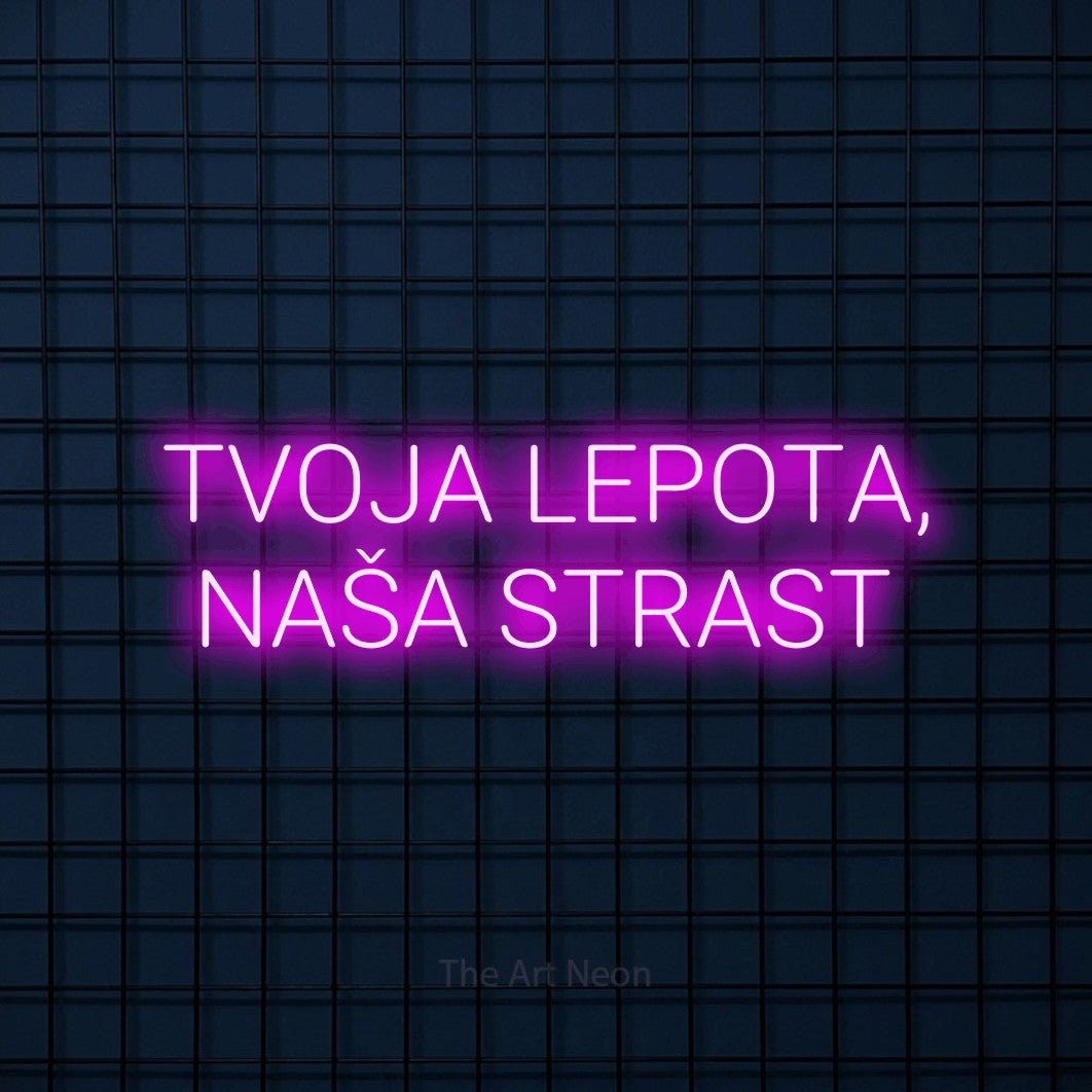 LED neon sign reading “TVOJA LEPOTA, NAŠA STRAST”, arranged in two lines.