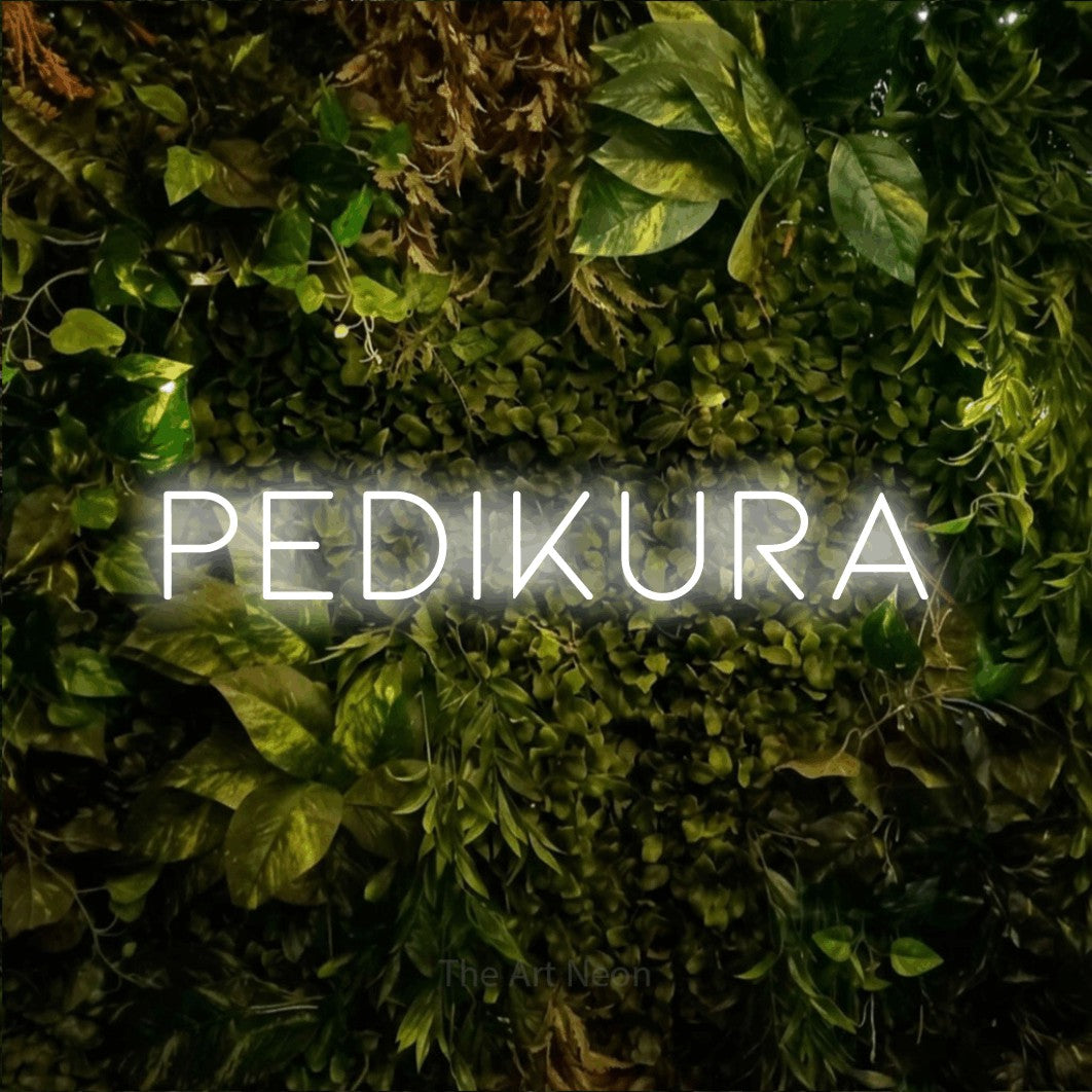 LED neon sign reading “PEDIKURA”, arranged in a single line.