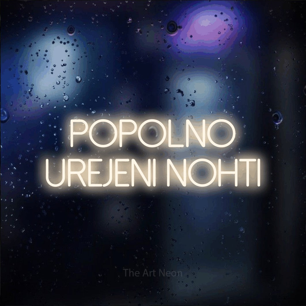 LED neon sign reading “POPOLNO UREJENI NOHTI”, arranged in two lines.