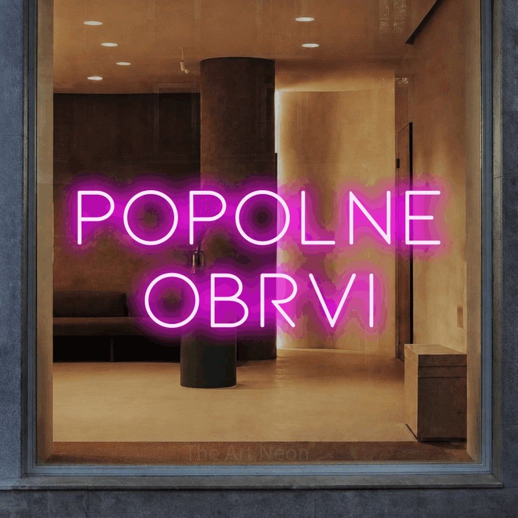 LED neon sign reading “Popolne Obrvi”, arranged in two lines.