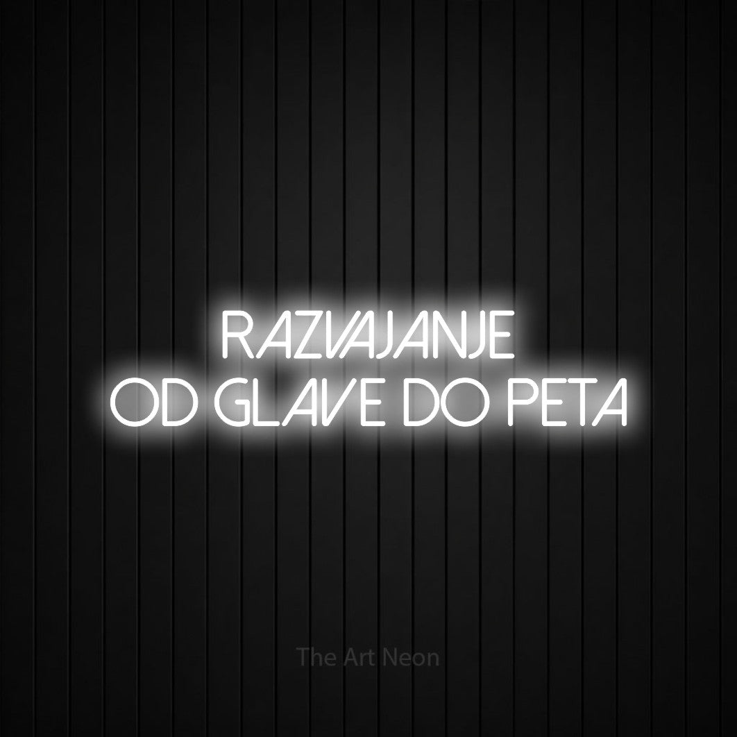LED neon sign reading “razvajanje od glave do peta”, arranged in two lines.
