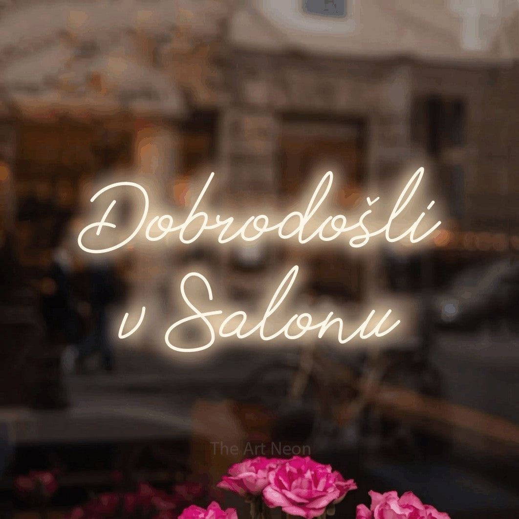 LED neon sign reading “Dobrodošli v Salonu”, arranged in two lines.