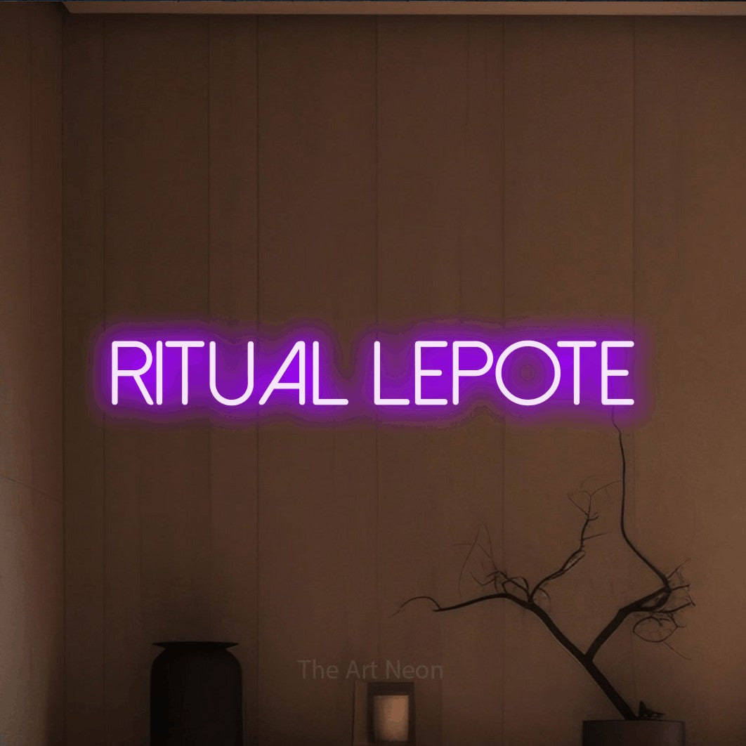 LED neon sign reading “ritual lepote”, arranged in a single line.