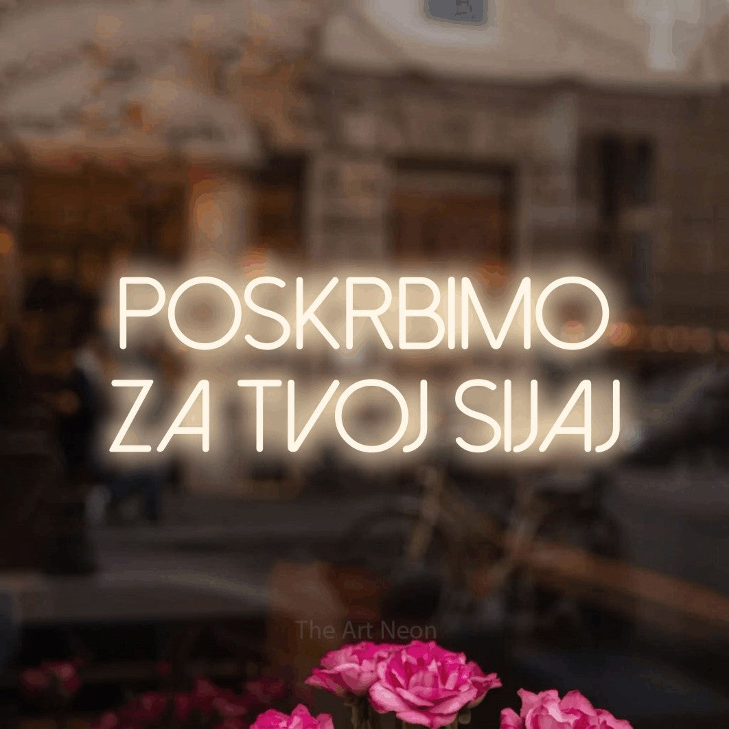 LED neon sign reading “Poskrbimo za Tvoj Sijaj”, arranged in two lines.