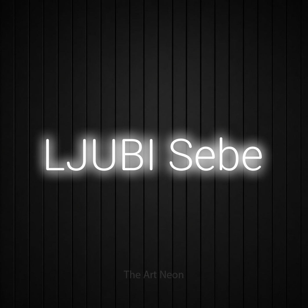 LED neon sign reading “LJUBI Sebe”, arranged in a single line.