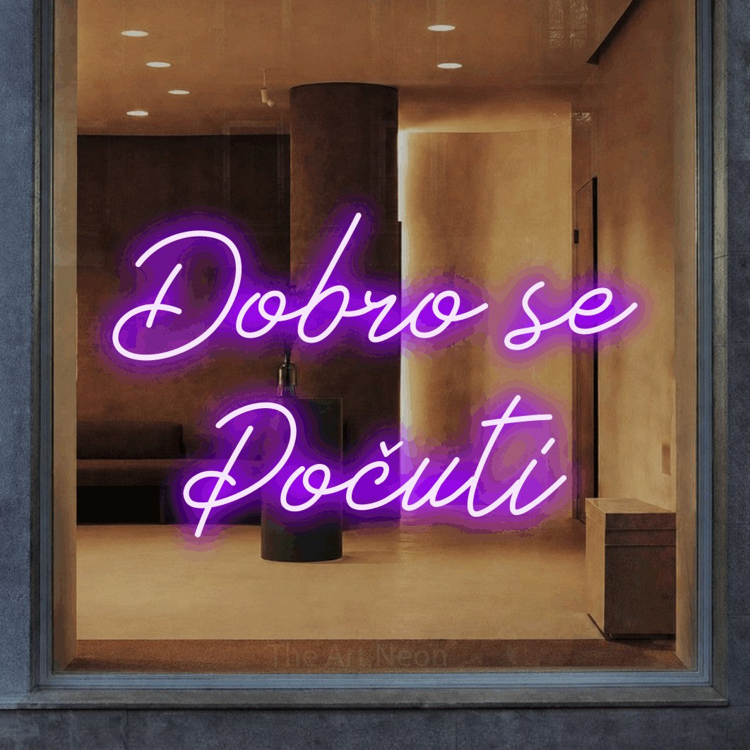 LED neon sign reading “Dobro se Počuti”, arranged in two lines.