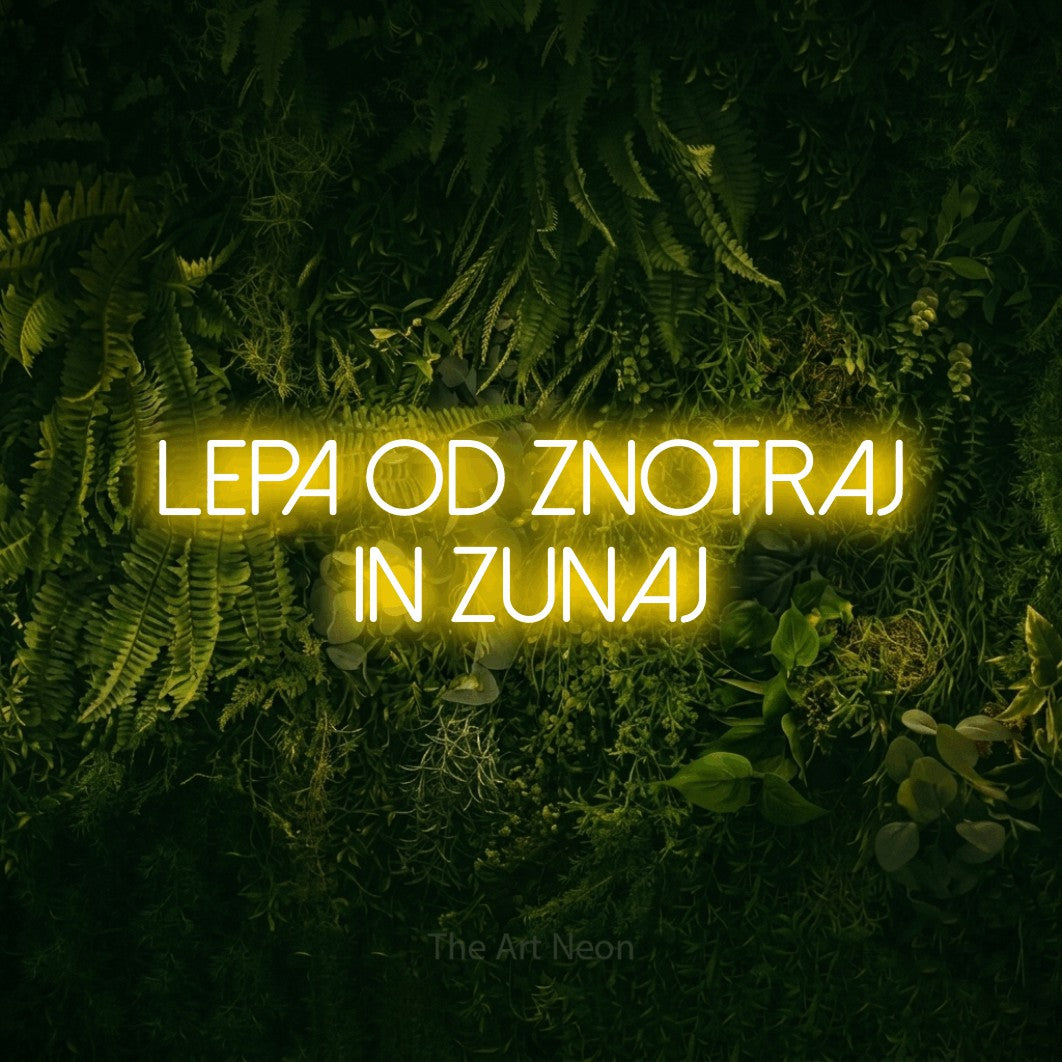LED neon sign reading “lepa od znotraj in zunaj”, arranged in two lines.