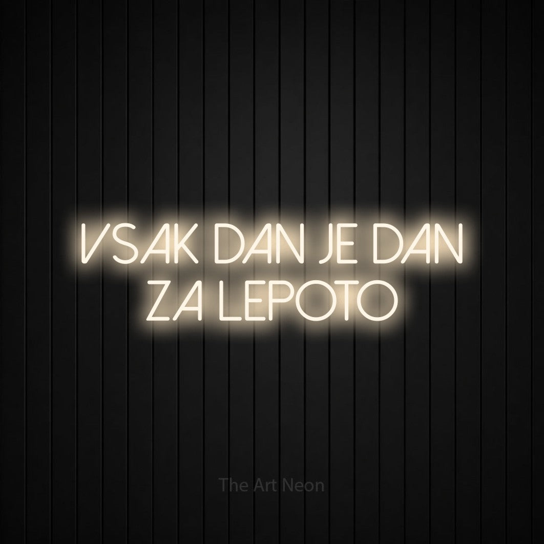 LED neon sign reading “Vsak Dan je Dan za Lepoto”, arranged in two lines.