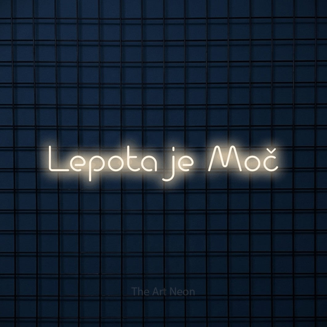 LED neon sign reading “Lepota je Moč”, arranged in a single line.