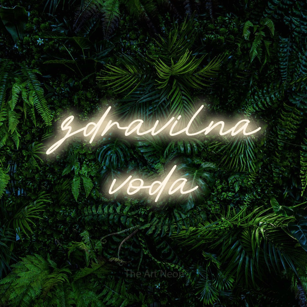 LED neon sign reading “zdravilna voda”, arranged in two lines.