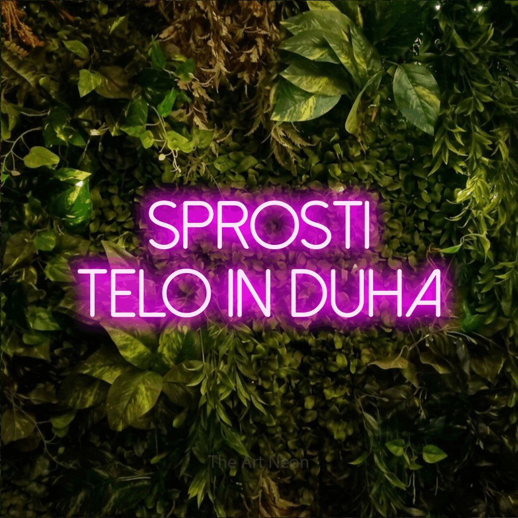LED neon sign reading “Sprosti Telo in Duha”, arranged in two lines.