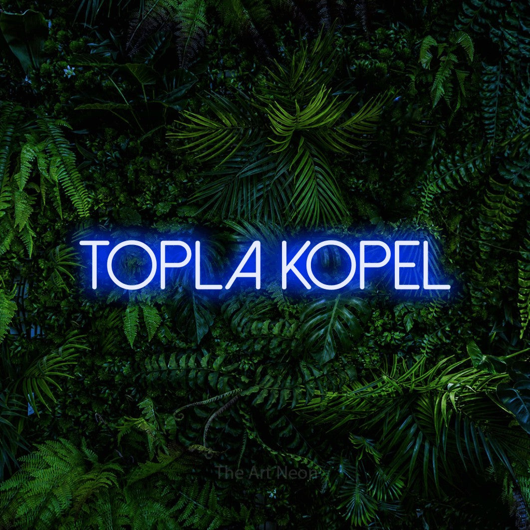 LED neon sign reading “Topla Kopel”, arranged in a single line.