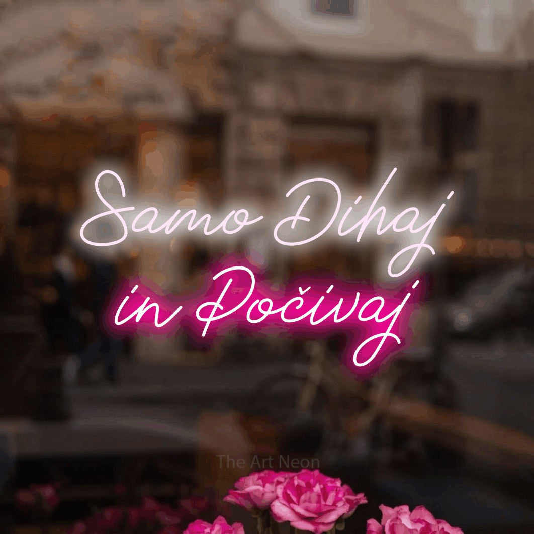 LED neon sign reading “Samo Dihaj in Počivaj”, arranged in two lines.