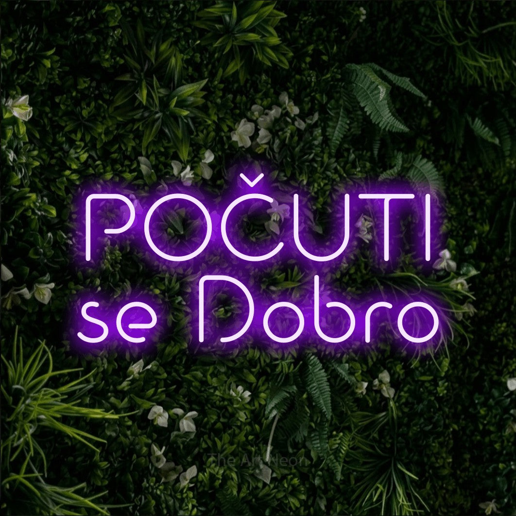 LED neon sign reading “POČUTI se Dobro”, arranged in two lines.