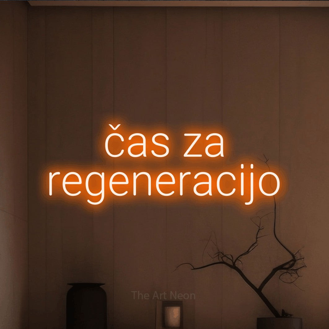 LED neon sign reading “čas za regeneracijo”, arranged in two lines.