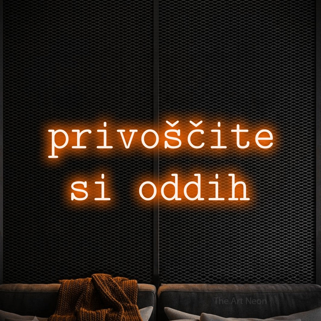 LED neon sign reading “privoščite si oddih”, arranged in two lines.
