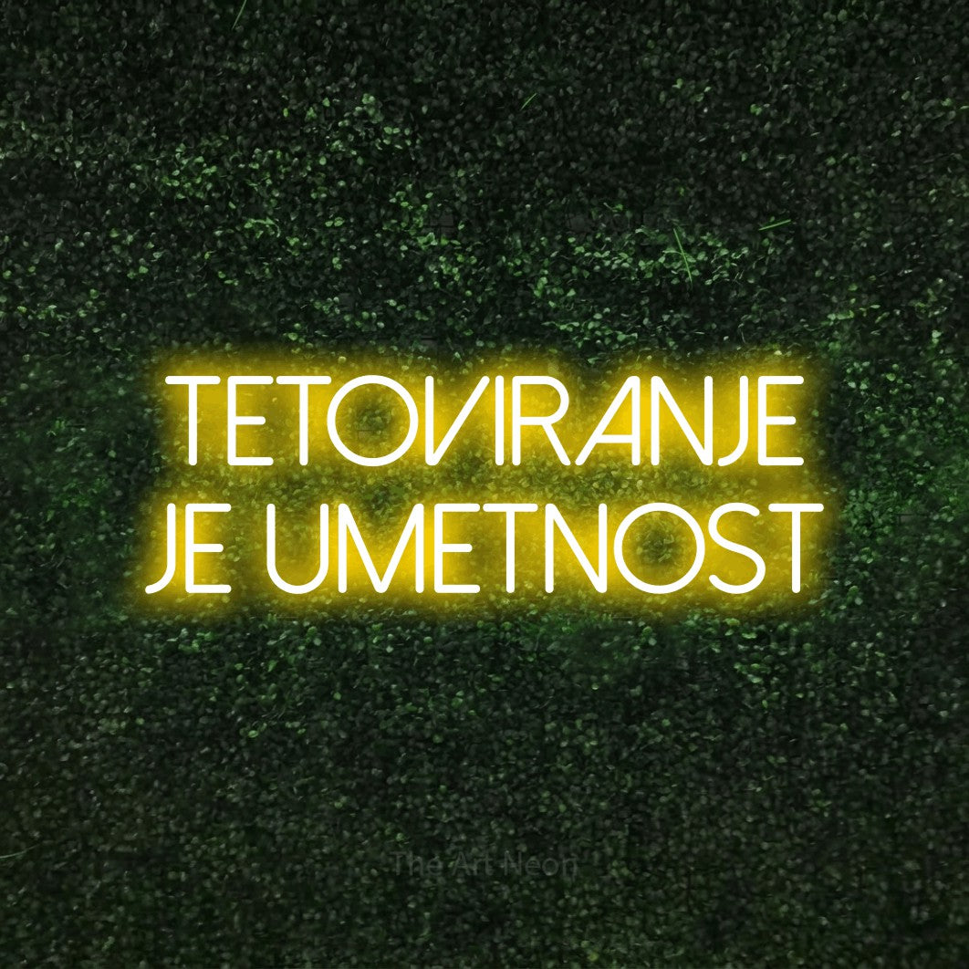 LED neon sign reading “TETOVIRANJE je Umetnost”, arranged in two lines.