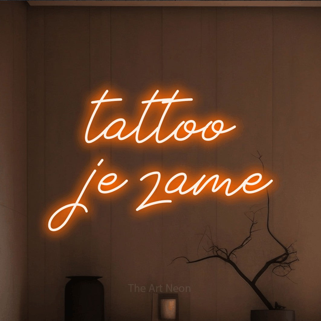 LED neon sign reading “tattoo je zame”, arranged in two lines.