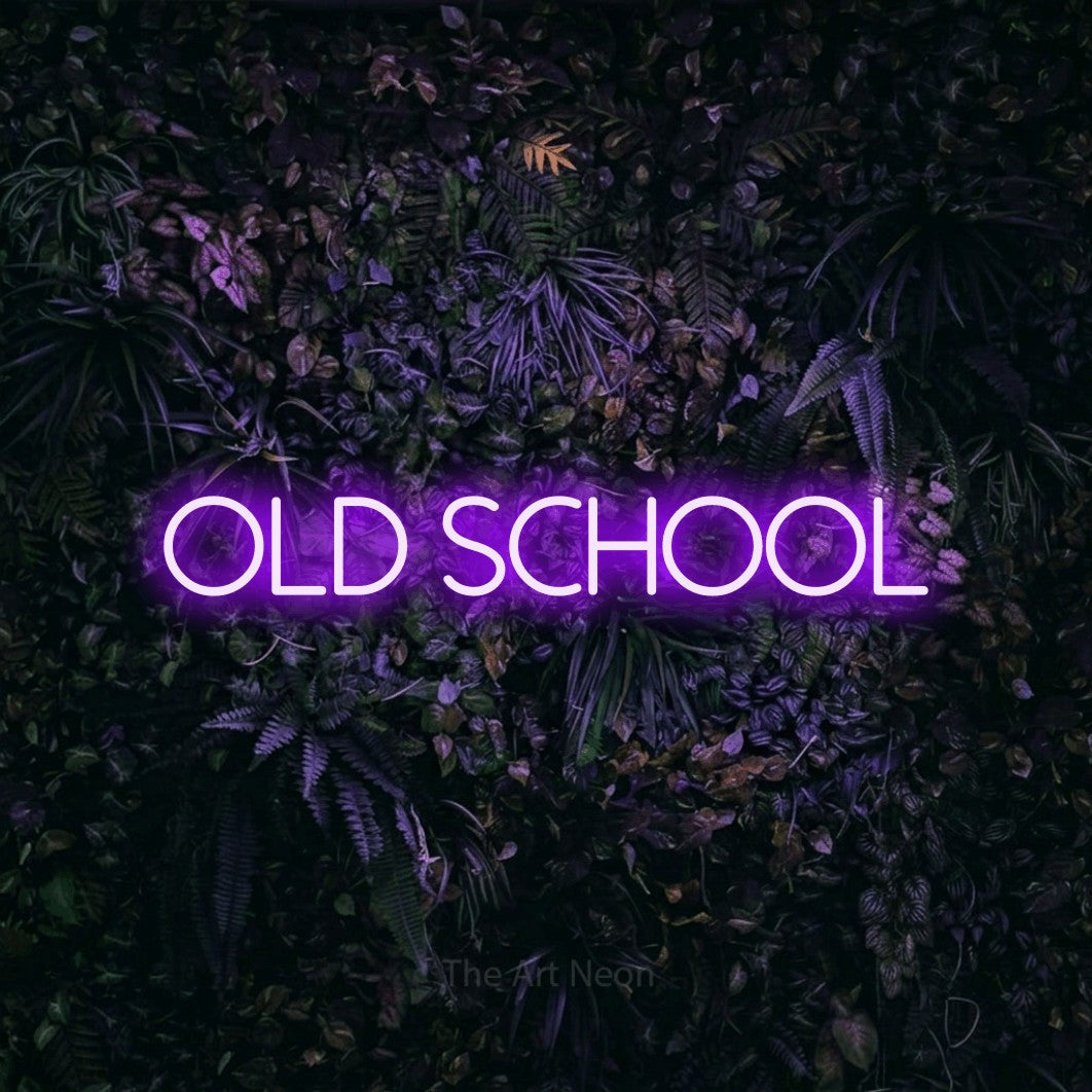 LED neon sign reading “old school”, arranged in a single line.