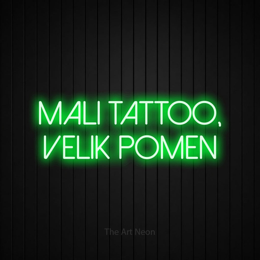LED neon sign reading “Mali Tattoo, Velik Pomen”, arranged in two lines.