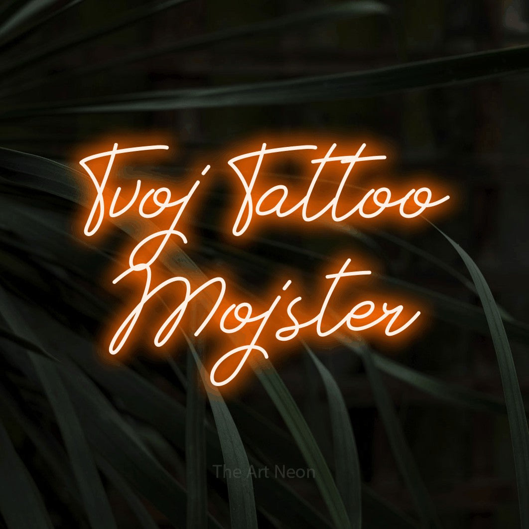 LED neon sign reading “Tvoj Tattoo Mojster”, arranged in two lines.
