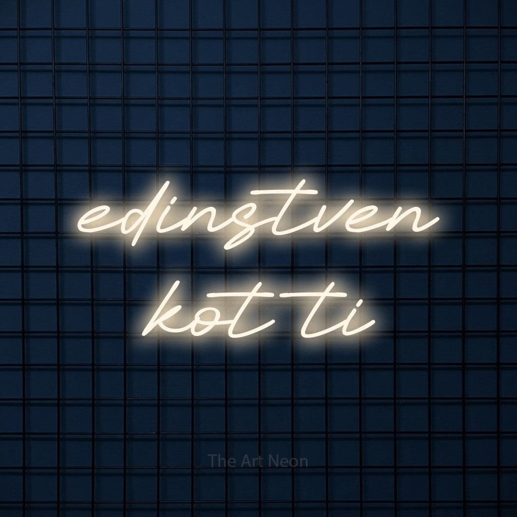 LED neon sign reading “edinstven kot ti”, arranged in two lines.