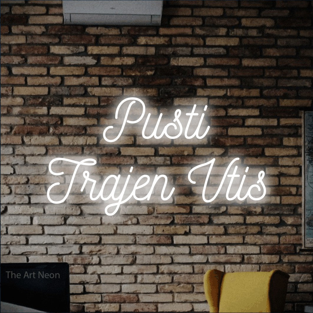 LED neon sign reading “Pusti Trajen Vtis”, arranged in two lines.