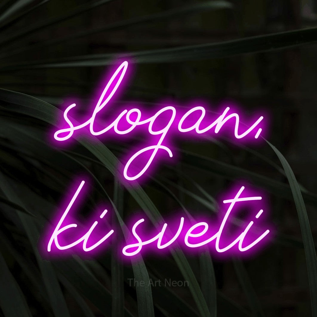 LED neon sign reading “slogan, ki sveti”, arranged in two lines.
