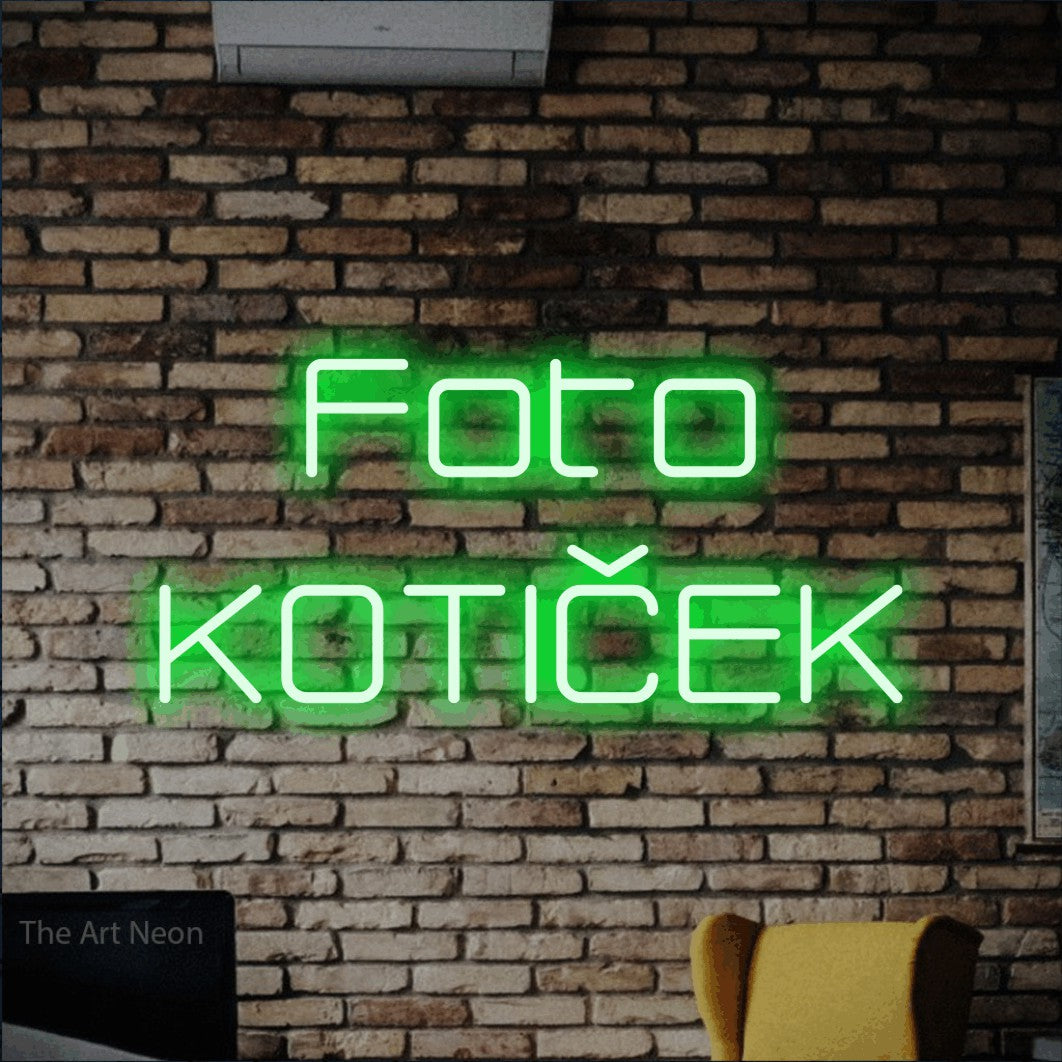 LED neon sign reading “Foto KOTIČEK”, arranged in two lines.