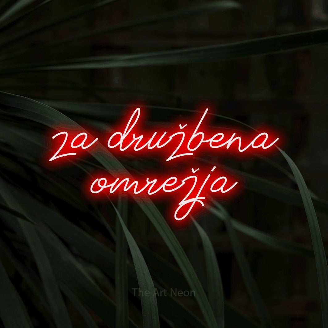 LED neon sign reading “za družbena omrežja”, arranged in two lines.