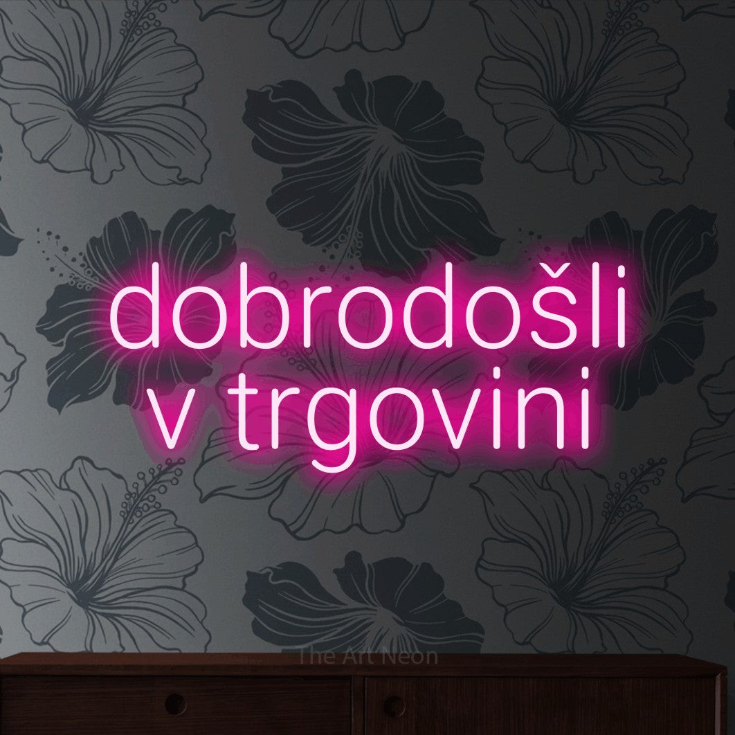 LED neon sign reading “dobrodošli v trgovini”, arranged in two lines.