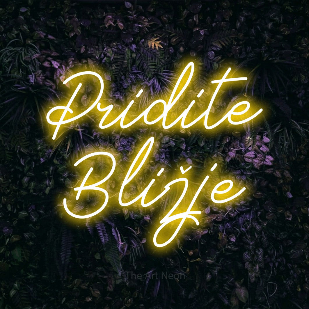 LED neon sign reading “Pridite Bližje”, arranged in two lines.