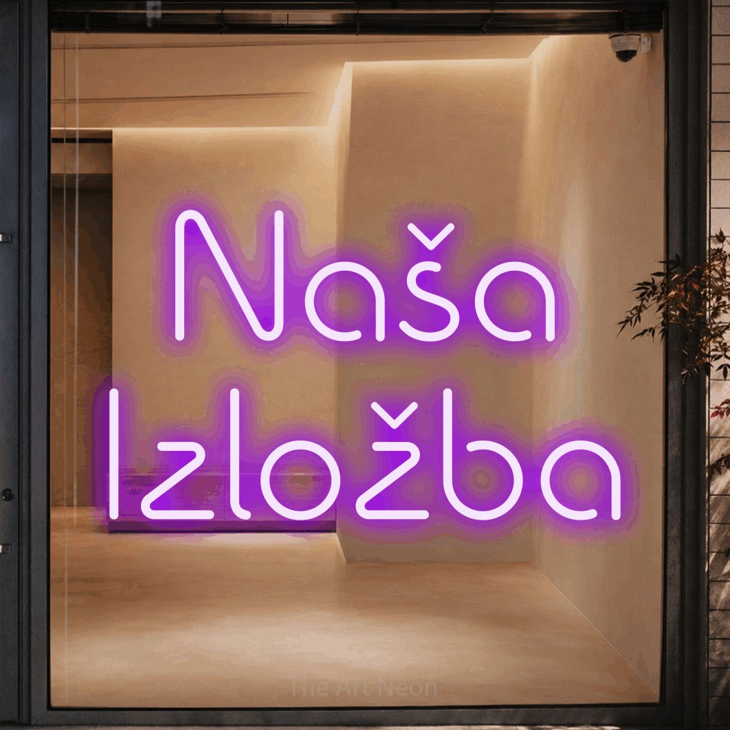 LED neon sign reading “Naša Izložba”, arranged in two lines.