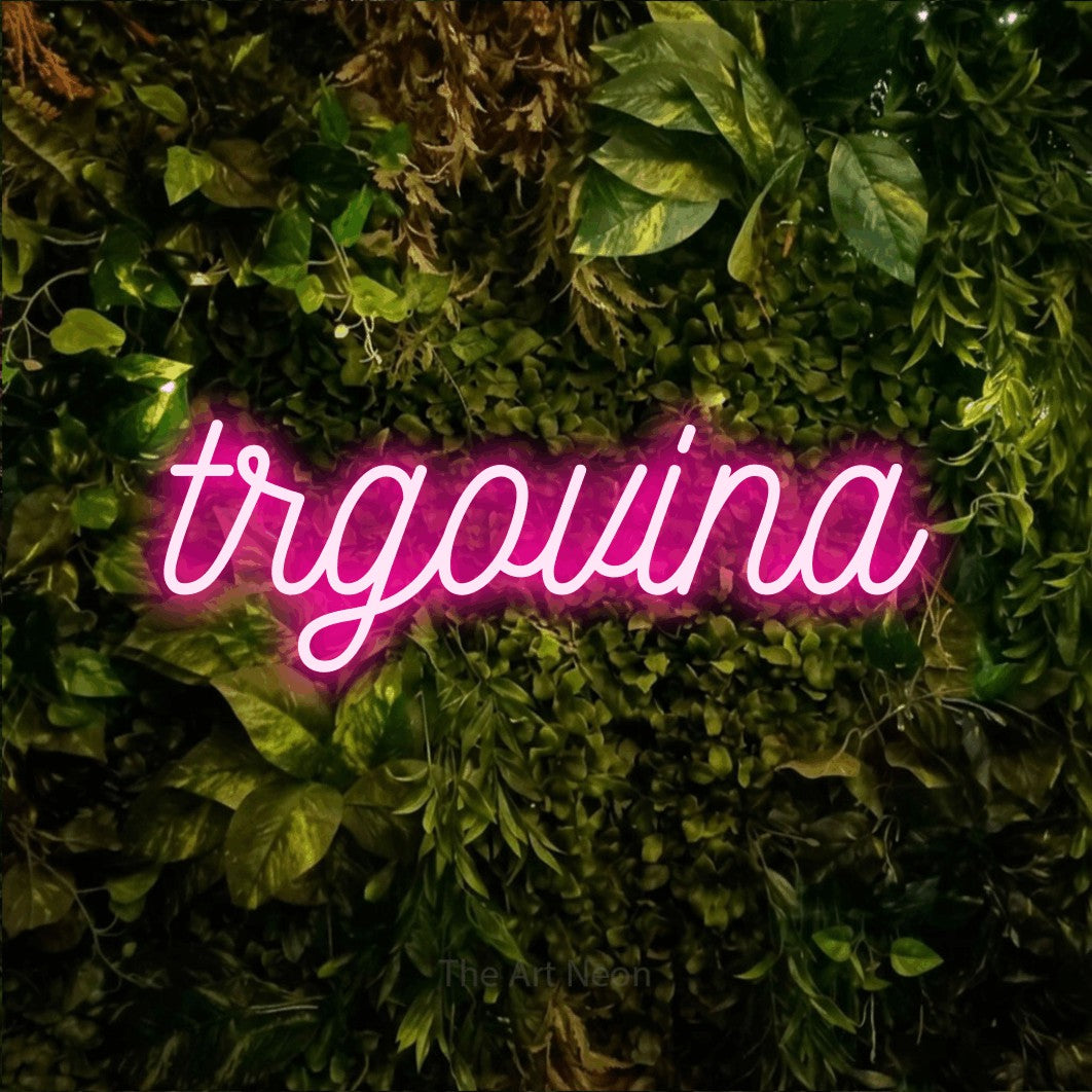 LED neon sign reading “trgovina”, arranged in a single line.