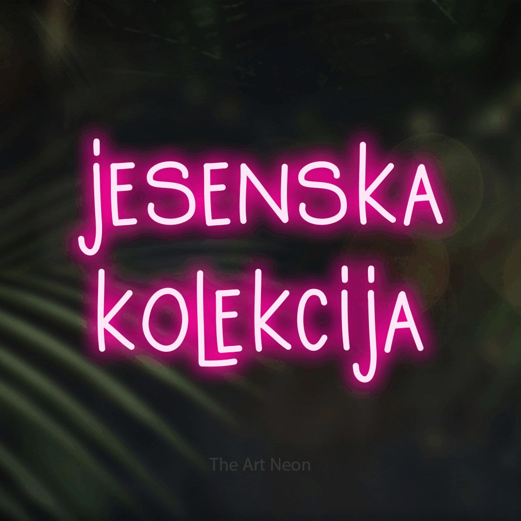 LED neon sign reading “jesenska kolekcija”, arranged in two lines.
