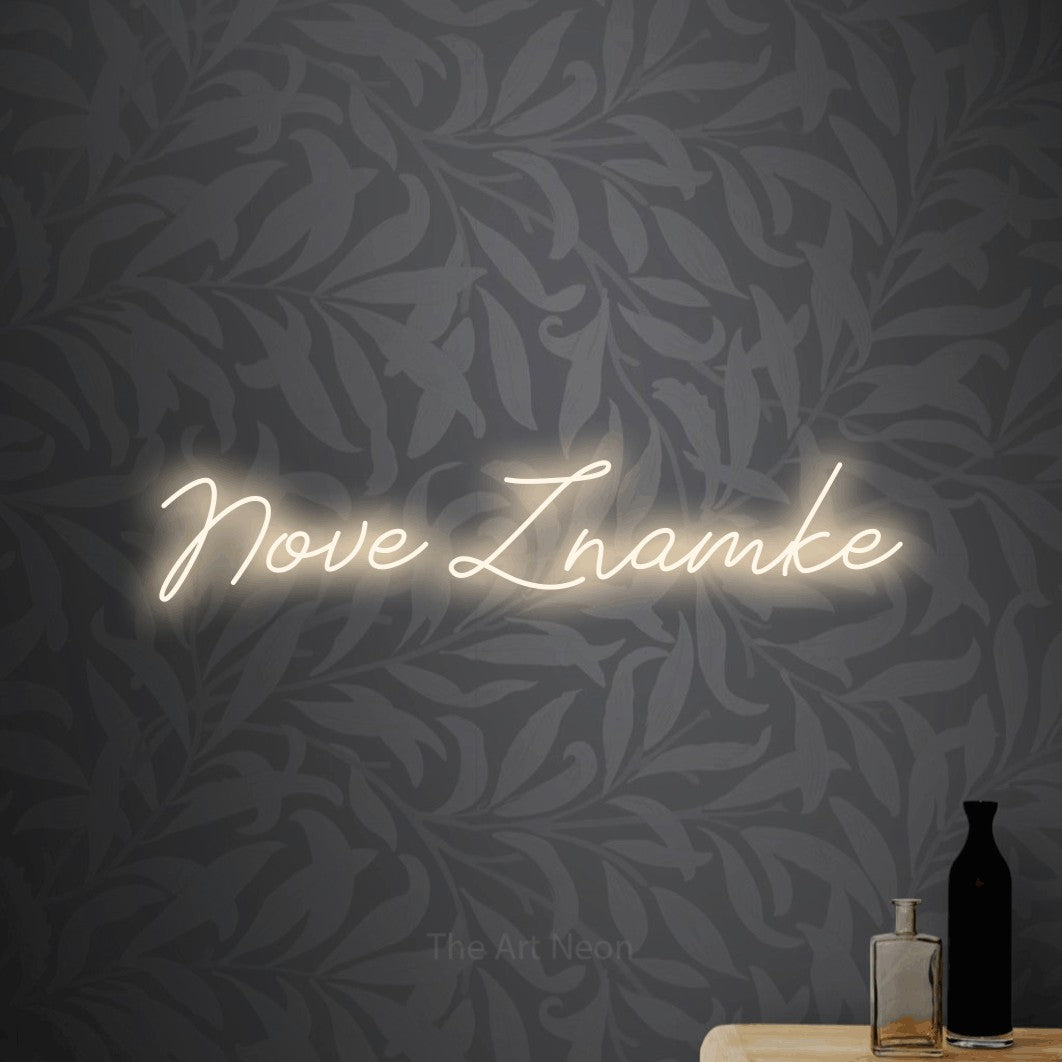 LED neon sign reading “Nove Znamke”, arranged in a single line.
