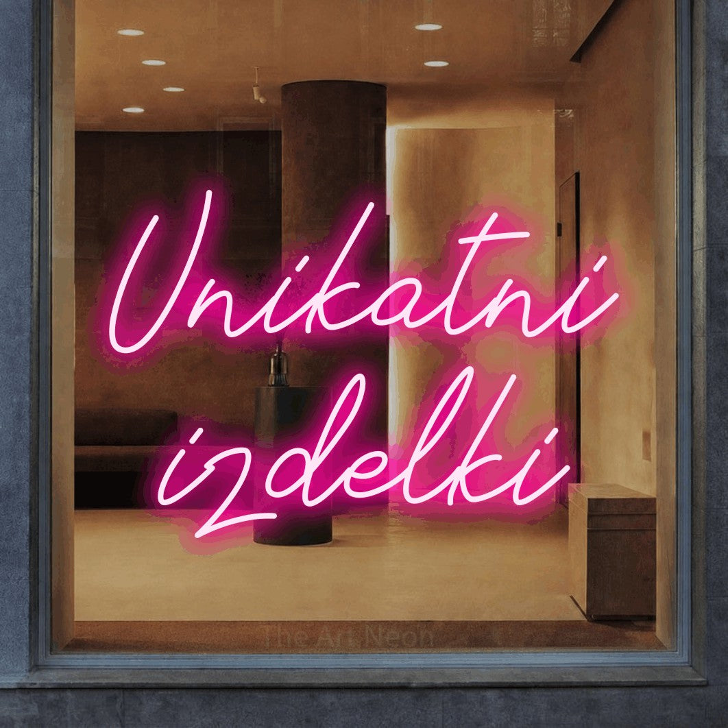 LED neon sign reading “Unikatni izdelki”, arranged in two lines.