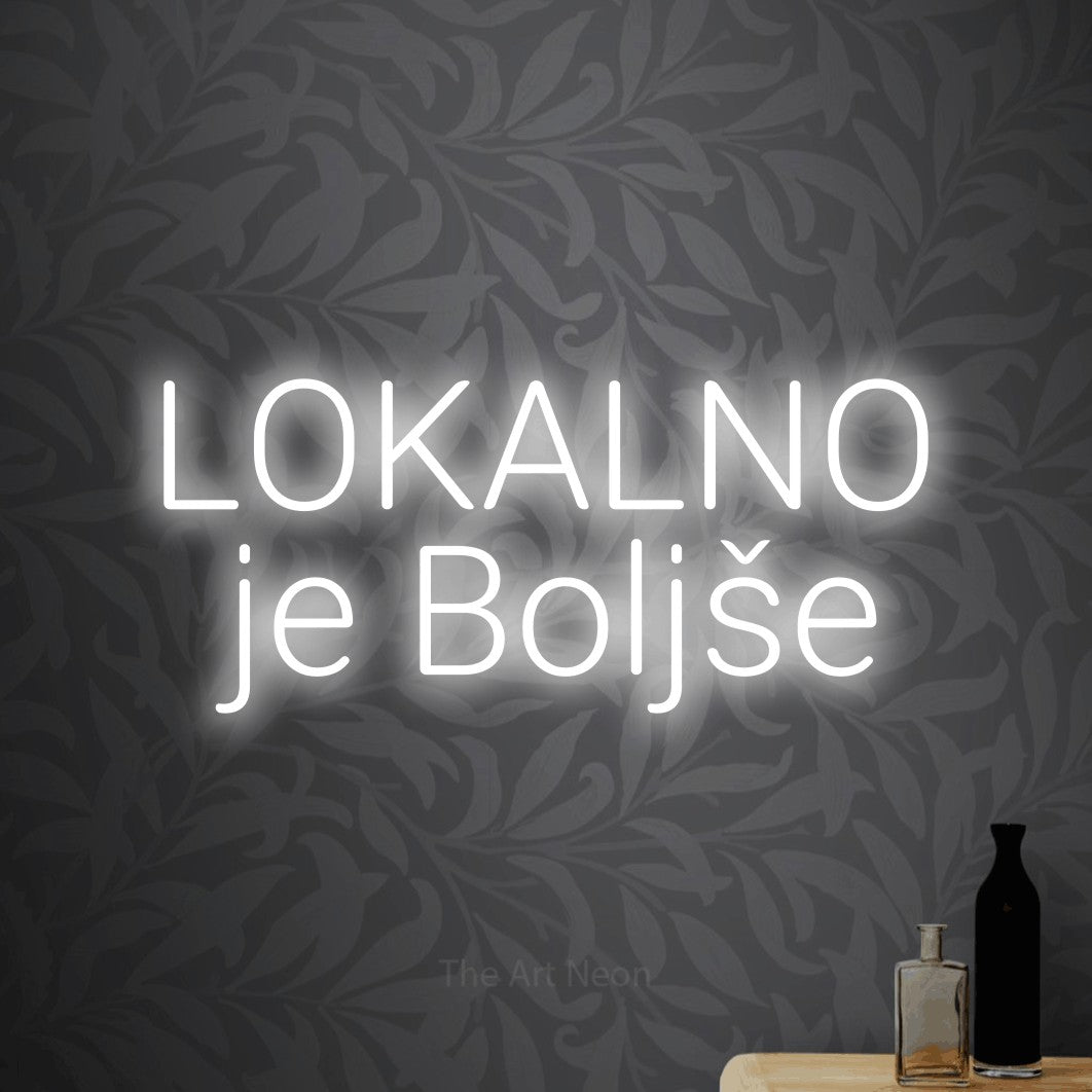 LED neon sign reading “LOKALNO je Boljše”, arranged in two lines.