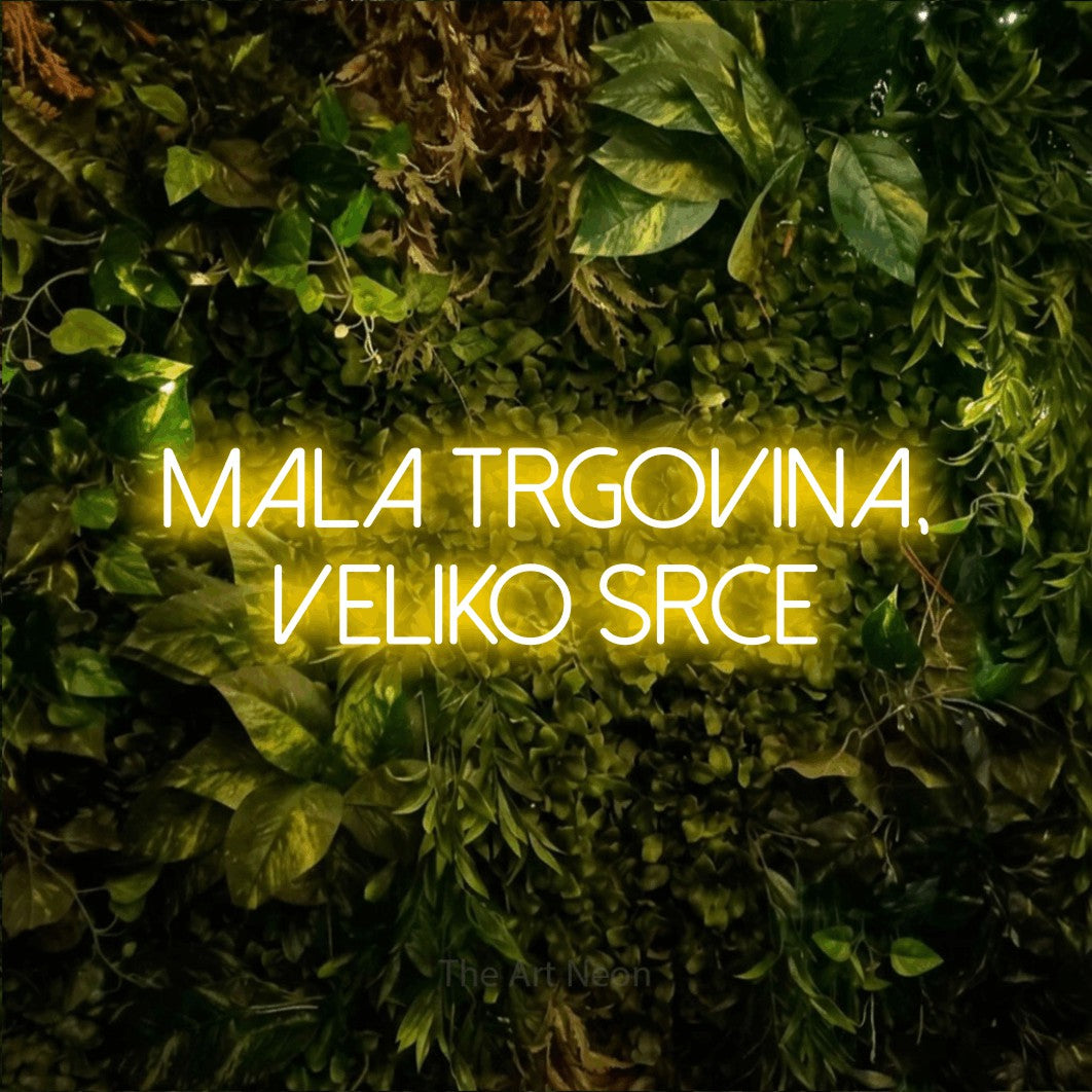 LED neon sign reading “Mala TRGOVINA, Veliko Srce”, arranged in two lines.