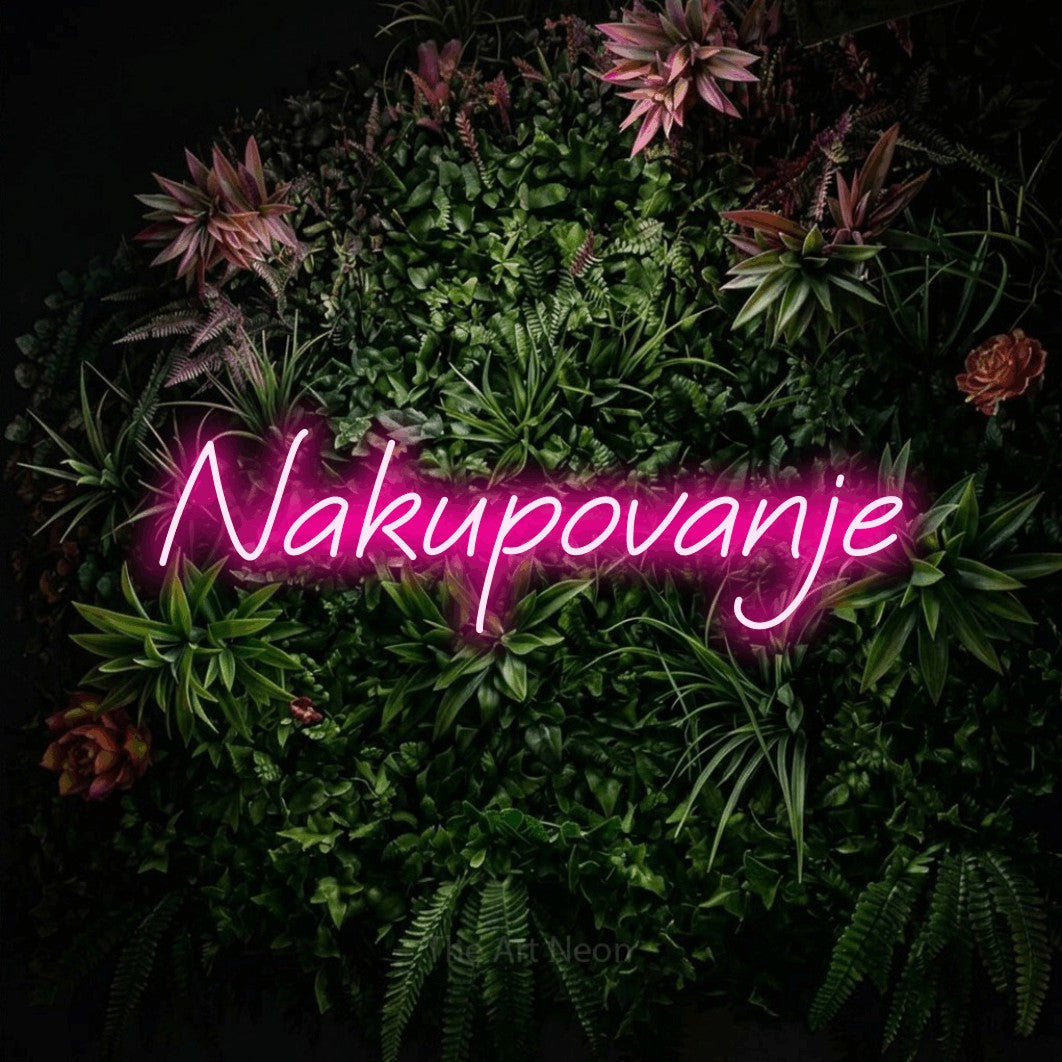 LED neon sign reading “Nakupovanje”, arranged in a single line.