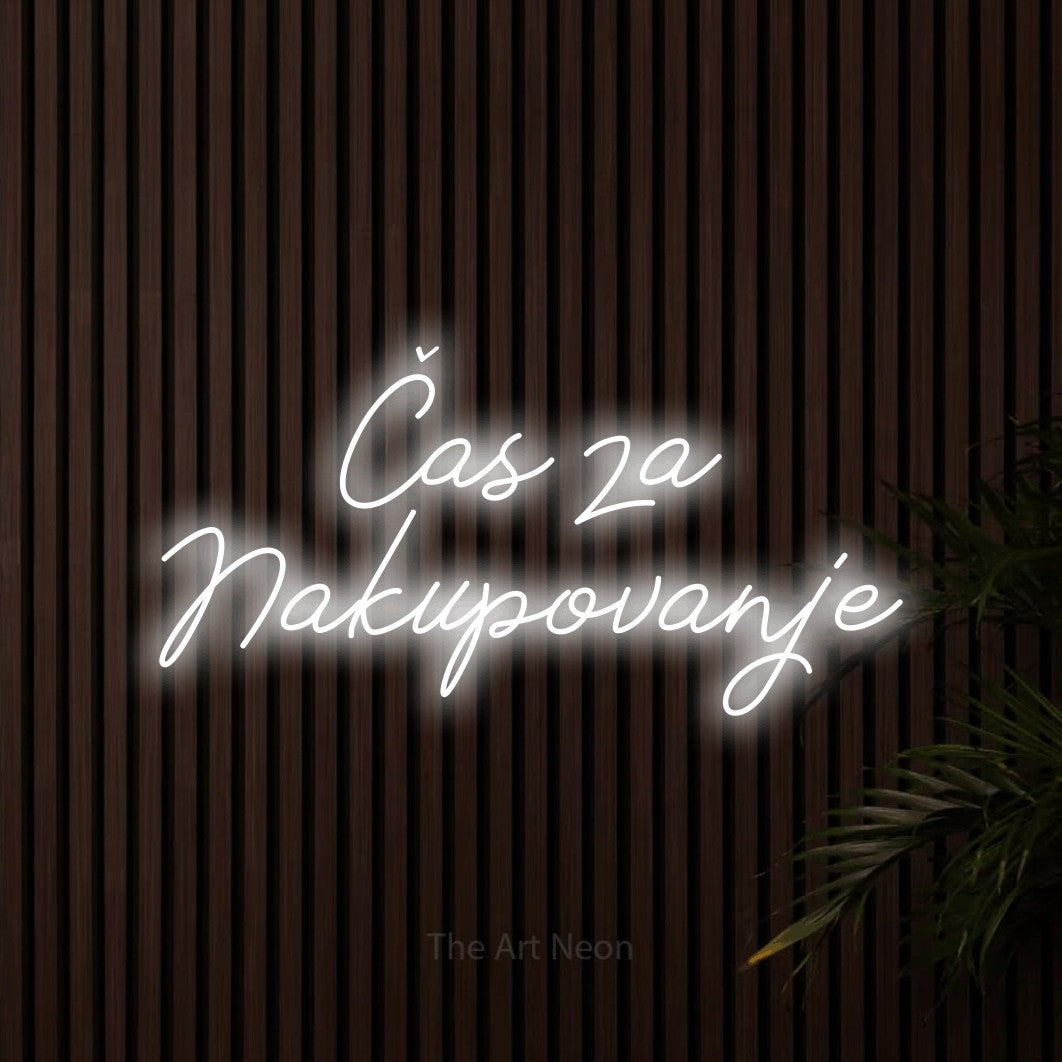 LED neon sign reading “Čas za Nakupovanje”, arranged in two lines.
