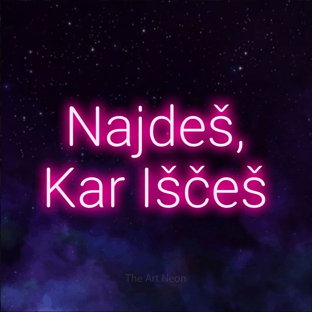 LED neon sign reading “Najdeš, Kar Iščeš”, arranged in two lines.