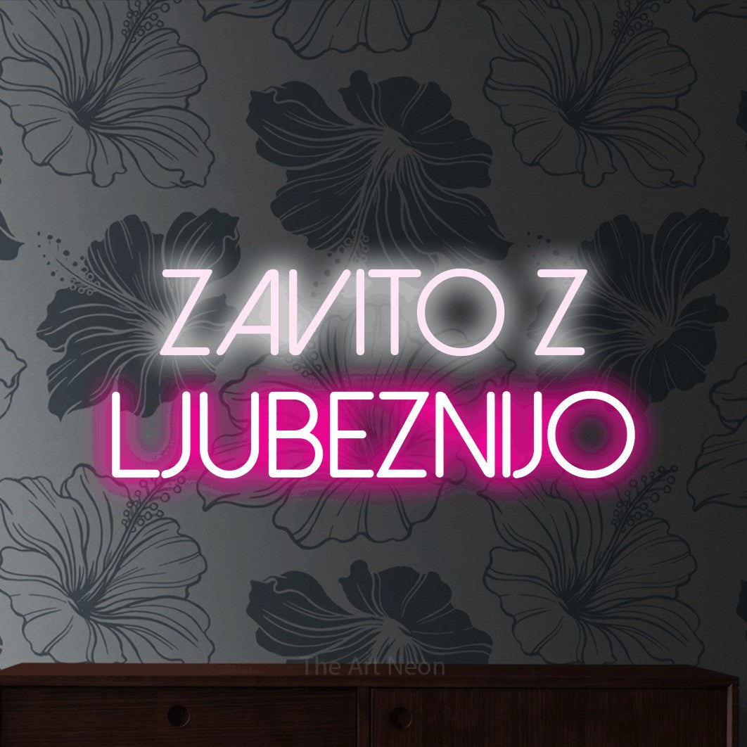 LED neon sign reading “Zavito z ljubeznijo”, arranged in two lines.